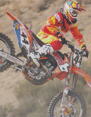 Motocross rider in the air.