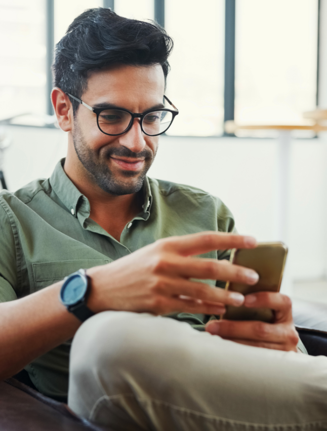 Man looking at smartphone.