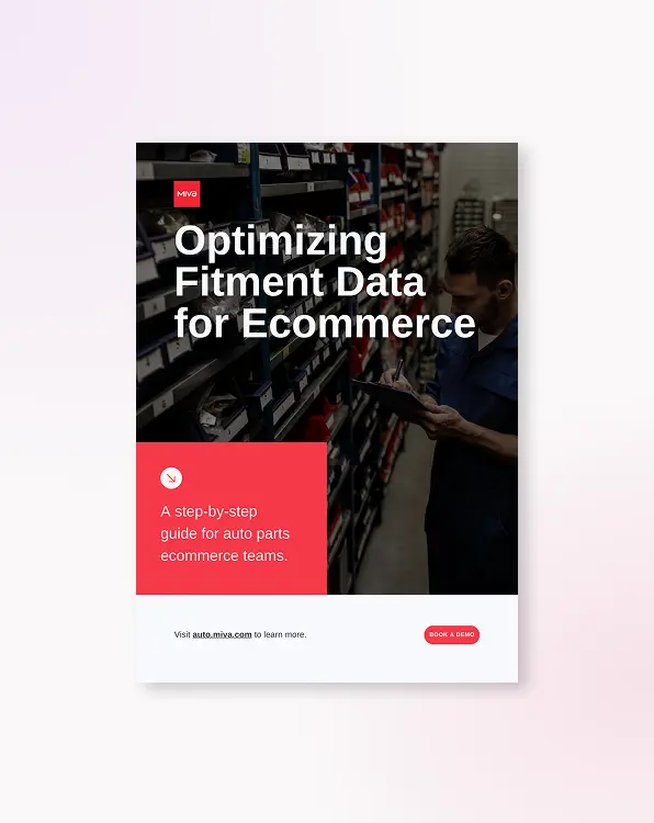 Cover of the Fitment Data guide, being held by a hand.