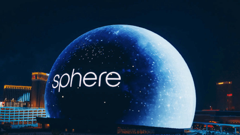Image of the Las Vegas Sphere with the word Sphere displayed on the outside of it.